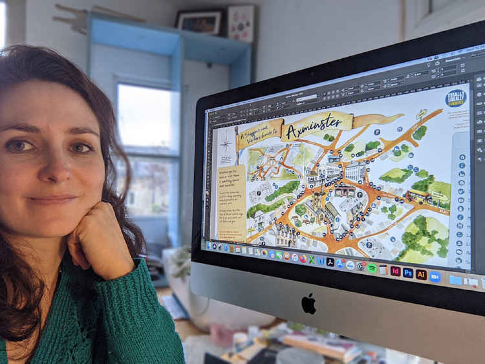 Artist Delphine Jones pictured with the map on screen
