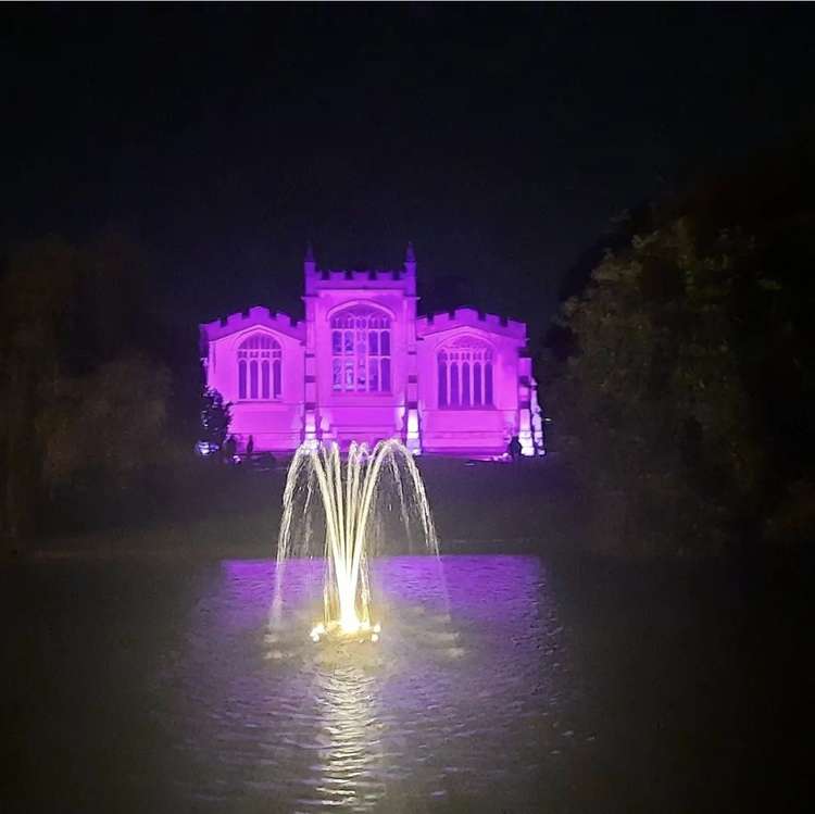 Hitchin: Iconic St Mary's Church bathed in purple light to support World Polio Day. CREDIT: Danny Pearson