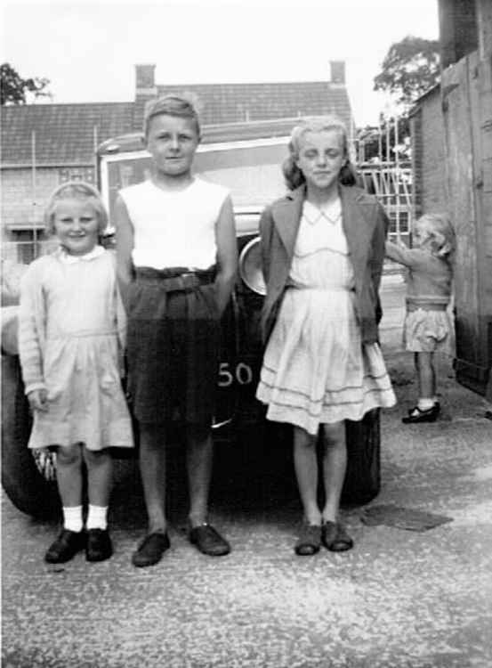 My cousin Rosemary  and my sisters Molly and Jane being inquisitive outside 14-1