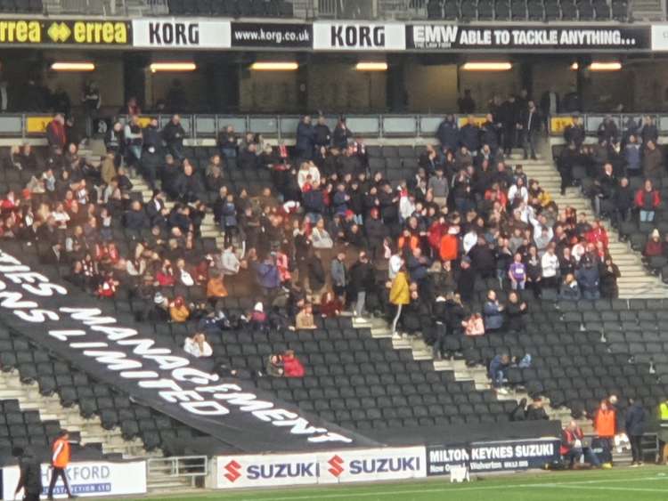 The travelling Stevenage fans at Milton Keynes to support the Boro in their FA Cup first round tie. CREDIT: @laythy29