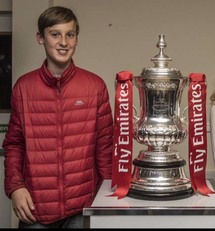 A young Freddie Cardy with the trophy on the same night. CREDIT: Peter Else