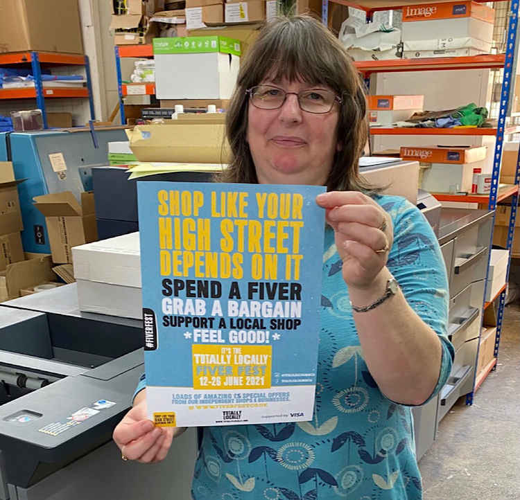 Hot off the press – Jane Rockett of Axminster Printing with a new Fiver Fest poster (photo by Keith Rockett)