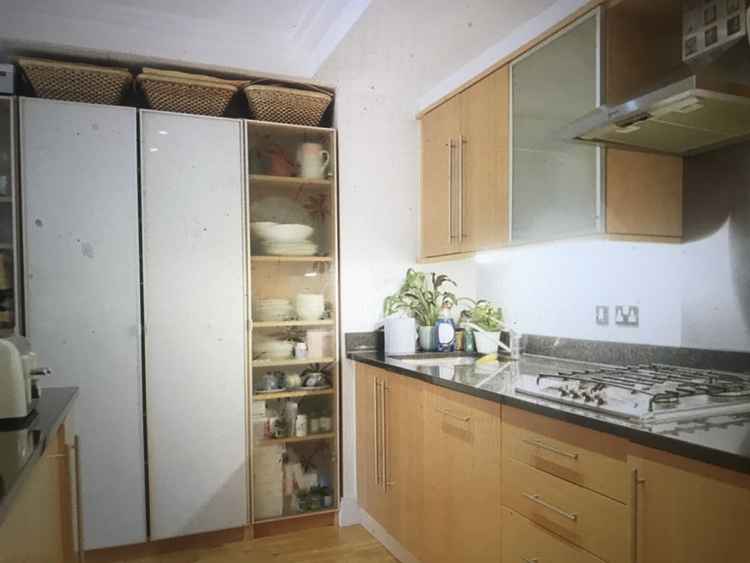 The apartment boasts fitted storage