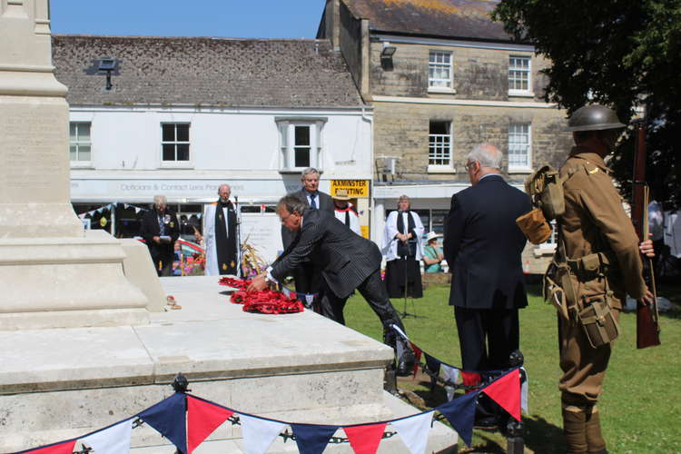 Mr Mervyn Symes, chairman of the Axminster branch, lays a wreath on behalf of the Royal British Legion