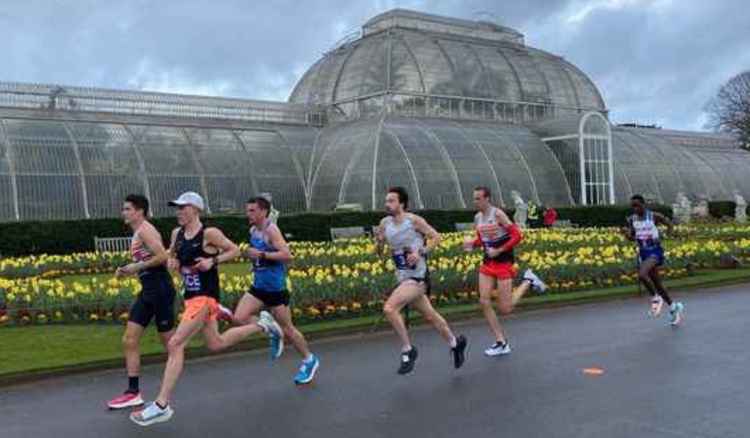 Runners heading past Temperate House