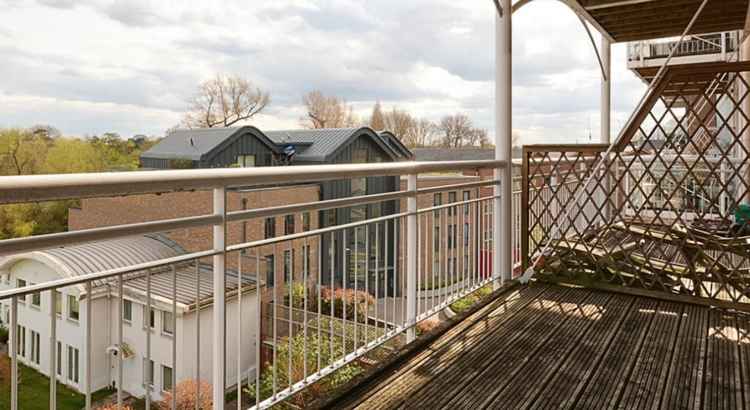 The apartment opens out to a balcony