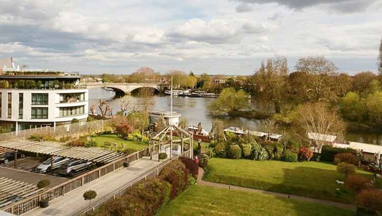 The apartment offers stunning views of Kew Bridge and the Thames