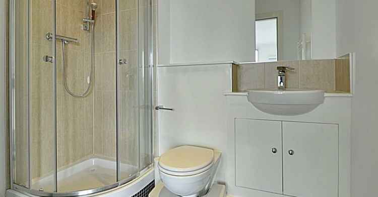 The property includes a modern fitted bathroom