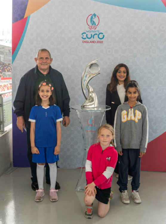 Hounslow Council leader, Steve Curran, with Councillor Samia Chaudhary and members of the local Wildcats at the women's trophy display. Image Credit: Hounslow Council