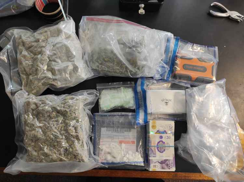 The drugs and cash seized by the officers. Image Credit: Hounslow Police