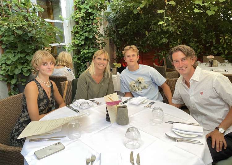 Frank and his family out for dinner on Friday, July 23. Image Credit: Villa di Geggiano