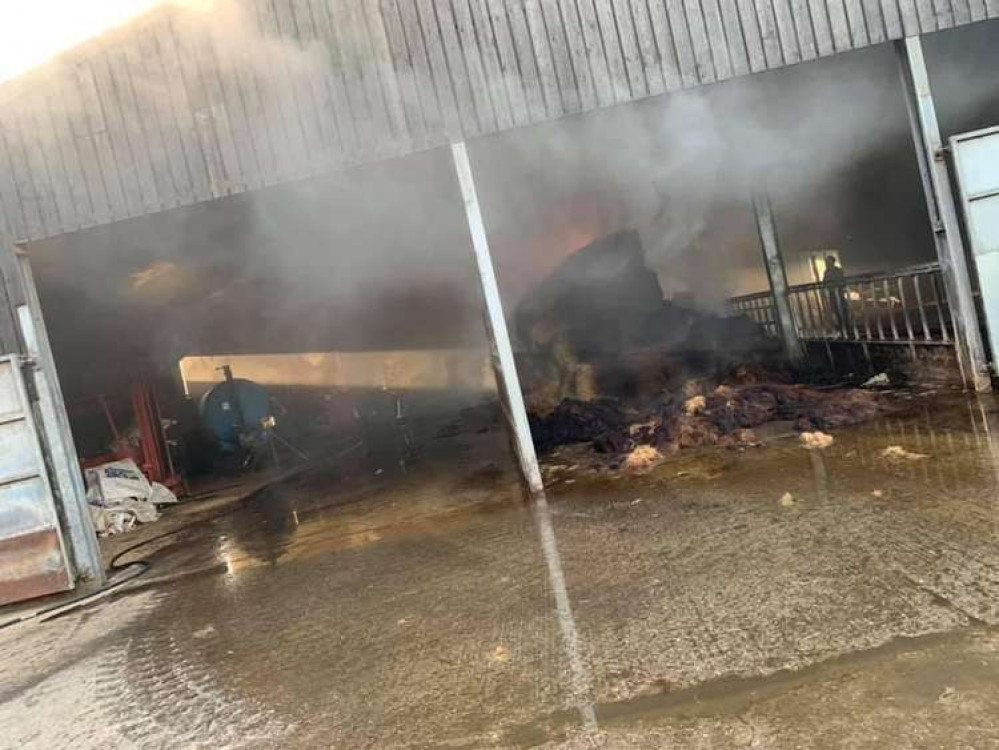 The fire involved approximately 200 bales of hay in an agricultural barn in Dalwood (photo: Axminster Fire Station)