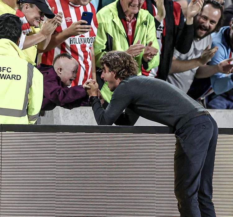 The embrace between Woody and manager Thomas Frank at Brentford - a heartwarming moment that went viral