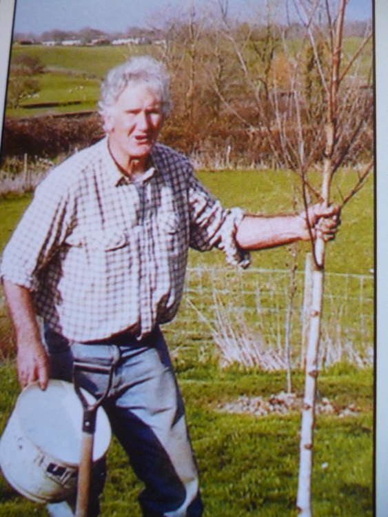 Mike Hankey planting trees at Cloakham Lawns