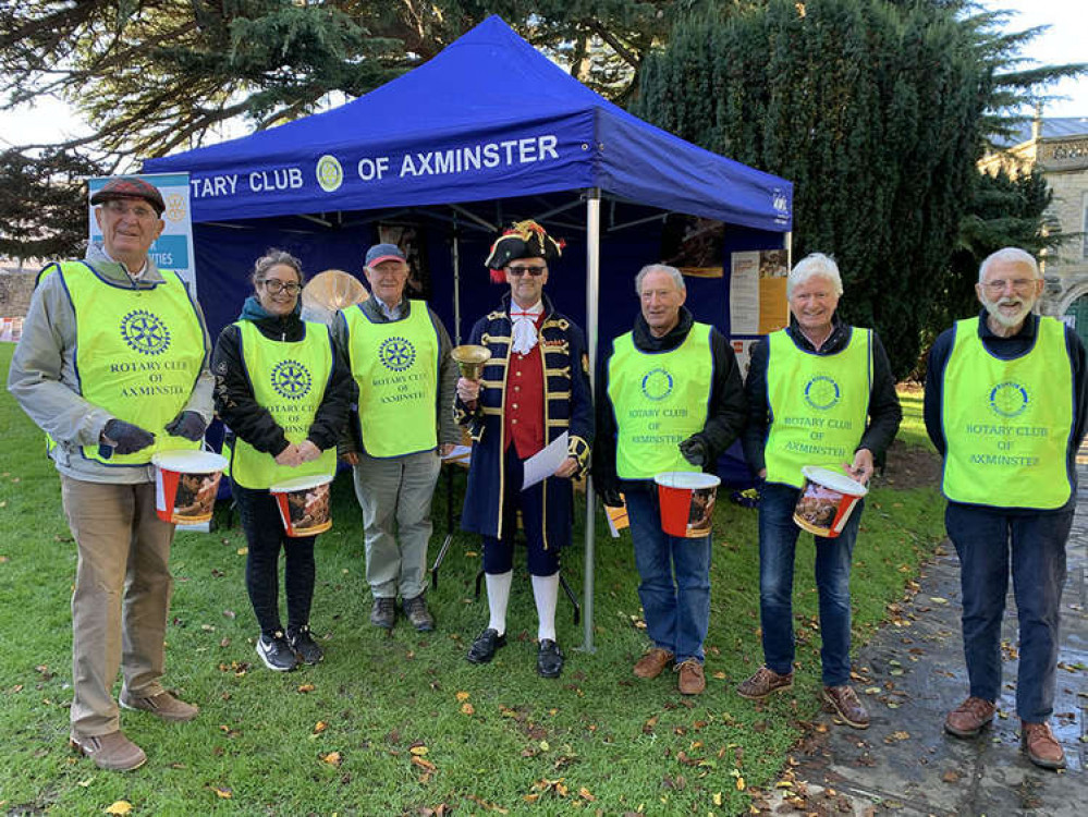 Axminster Rotarians pictured at the weekly street market where they were raising money to eradicate polio. Town crier Nick Goodwin publicised the event with a special cry.