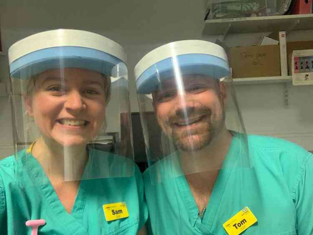 Nurses wearing the protective visors made by Richmond graphics company