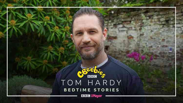Movie tough-guy Tom Hardy reads bedtime stories for children from his Richmond garden
