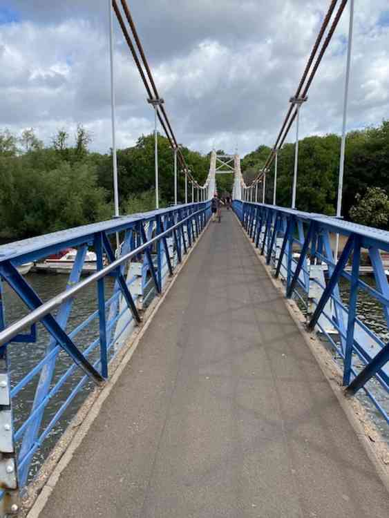 Cyclists and joggers make use of the footbridge