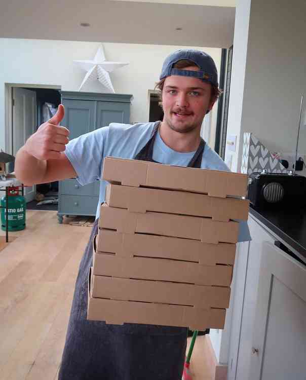 Henry's in charge of pizza production line from the family home in Teddington