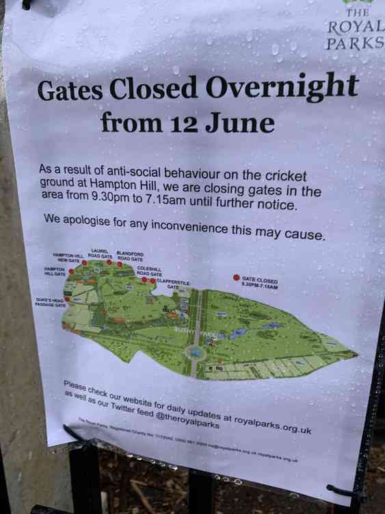 Signs warning of overnight closures at Bushy Park