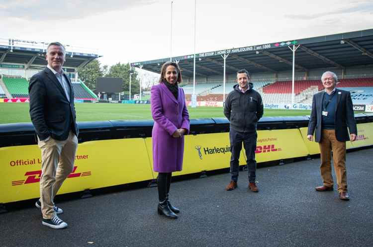 Munira is pitch side with Harlequins CEO Laurie Dalrymple. From left to right: Cllr Gareth Roberts (Leader of Richmond Upon Thames Council), Munira Wilson (MP for Twickenham), Laurie Dalrymple (CEO of Harlequins), Cllr Piers Allen (Cabinet Member for Adul