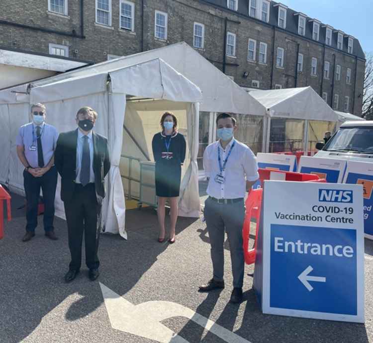 MP John Whittingdale meets Nigel Leonard and Melissa Dowdeswell at the vaccination centre