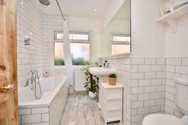 A modern bathroom completes the flat's interior