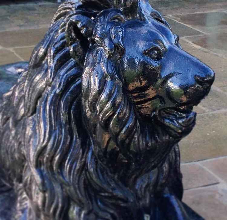 One of the club's lion sculptures pre-makeover