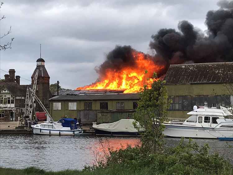 The inferno engulfs a building on the island / Credit: Twitter user @theCumbercat