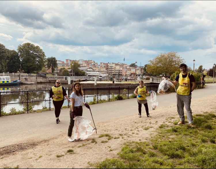 The RNLI litter pickers on their Mayday Mile / Credit: Gianna Saccomani