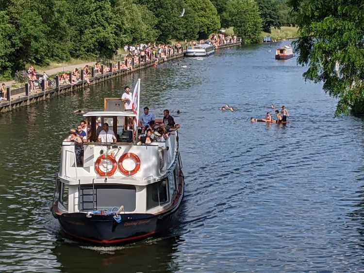 Swimmers clashed with boats by the Lock as people sought to escape the heat