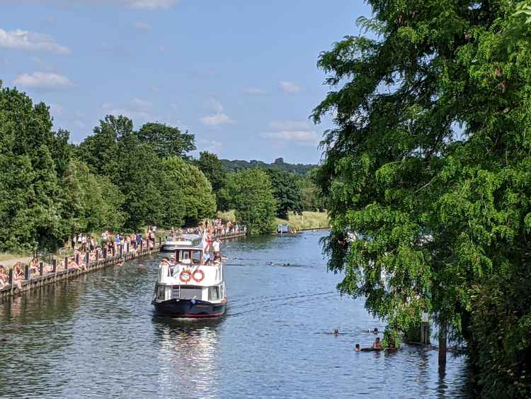 Hundreds of people flocked to the Thames to cool off on the hottest day of the year