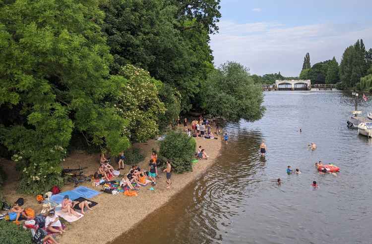 The 'beach' between the Lock footbridges is popular with sun-seekers