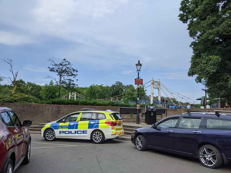 A police car at the Lock. Officers were called to deal with reports of people jumping from the bridges