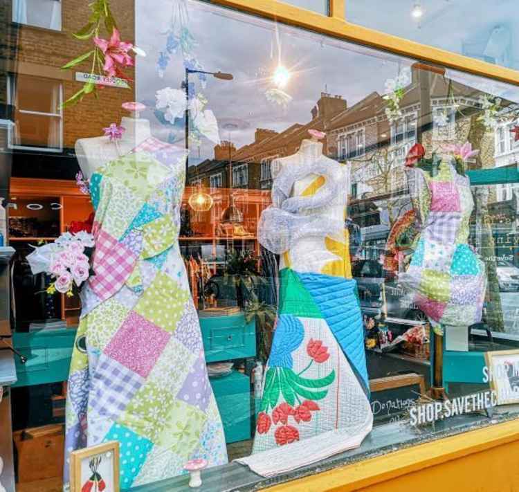 A window display she made earlier this year as part of her role managing a Save the Children charity shop