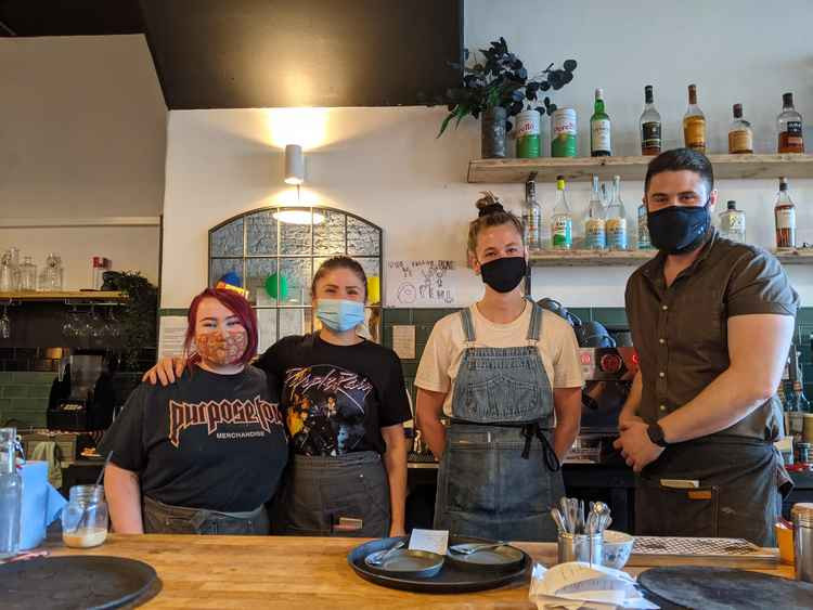 Staff at popular Teddington cafe The Fallow Deer counter including assistant manager Drew, second right (Credit: Nub News)