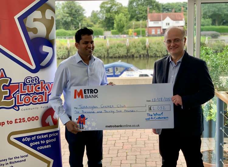 Andrew Hall, Chairman of Teddington Cricket Club Juniors, receives the cheque (Image: Get Lucky Local)