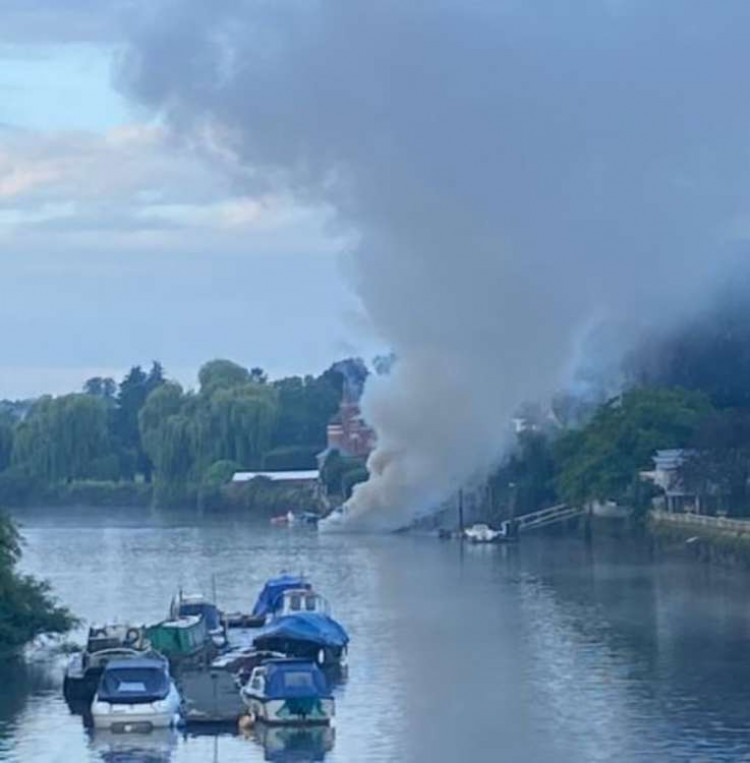 Puffin on fire, taken by a passer-by from Twickenham's Eel Pie Island footbridge