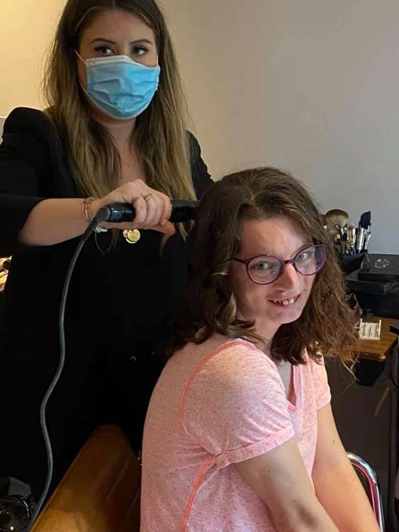 Volunteer and rider Philippa has her hair done for the special occasion (Image: Park Lane Stables)