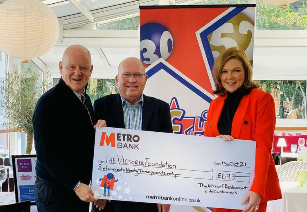 From left to right: Get Lucky Local co-founder Mark Taylor, and John Hamblin and Linda Duberley from the Victoria Foundation at the Wharf cheque presentation