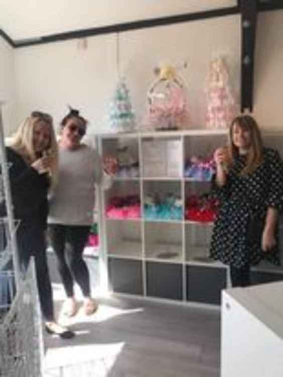 From left: business partners Amanda, Claire and customer Elaine celebrate