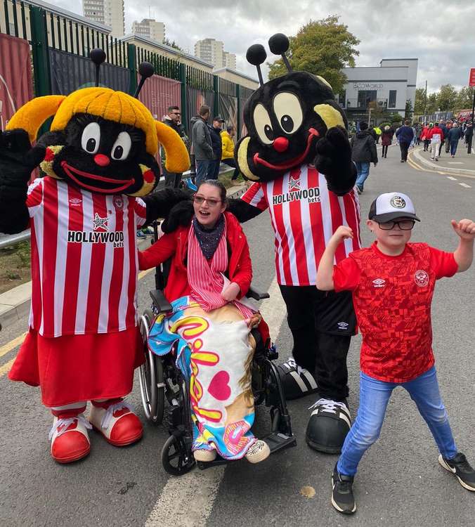 Lucy and Woody with the Brentford Bee mascots (Image: Natalie O'Rourke)