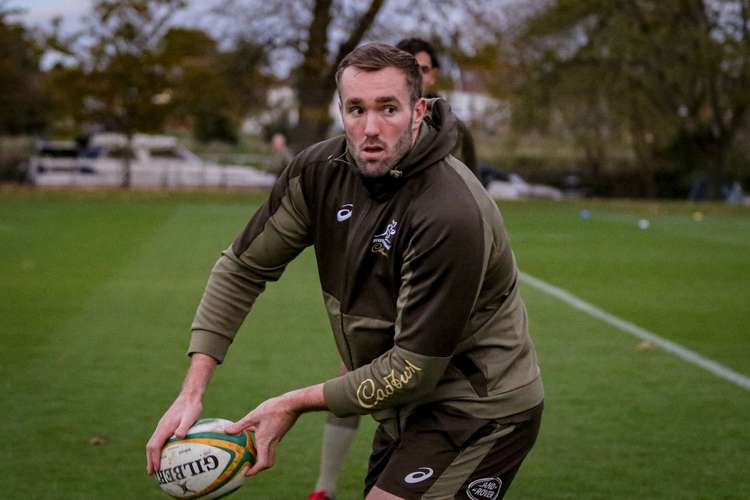 Izack Rodda, the team's lock, looks to pass the ball  (Image: Andrew Phan/Wallabies Media)