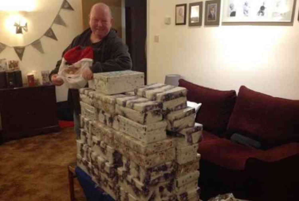 Garry Wakeham of Open Arms East Devon with Christmas parcels ready for distribution.