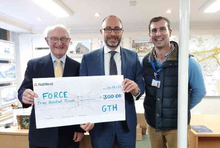 David Cantle of FORCE Cancer Charity with Stephen Gardner (GTH) holding the cheque being donated to the charity