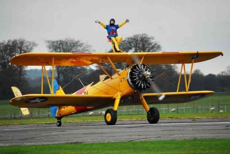 Ann Stirzaker, Sales Advisor at Hospiscare's Topsham shop, undertaking her Wing Walking challenge