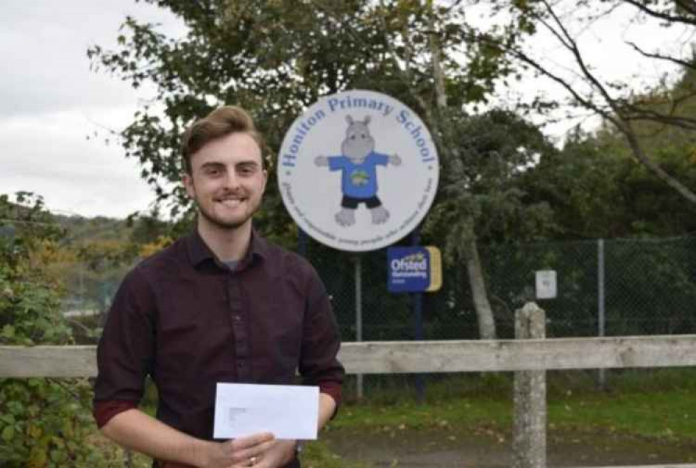 Jake Bonetta outside Honiton Primary School