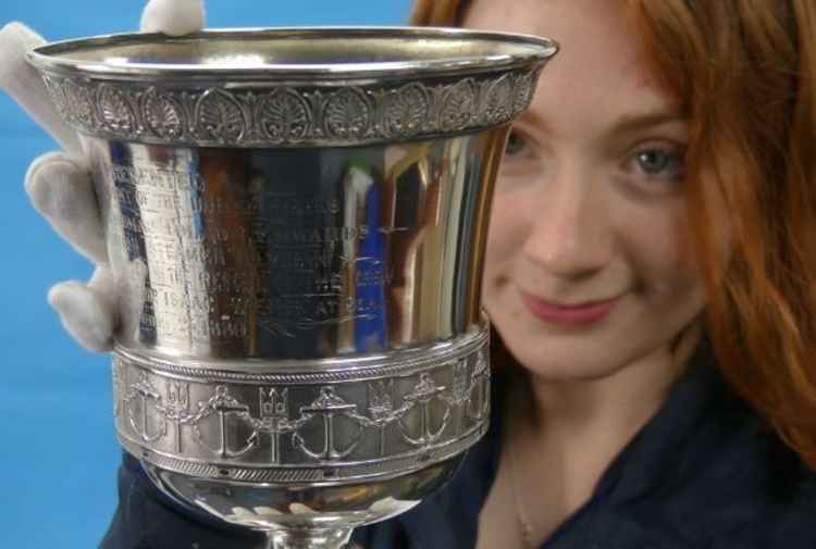 Mary Chilcott with the Tolson Cup. Photo credit: Chilcotts Auctioneers