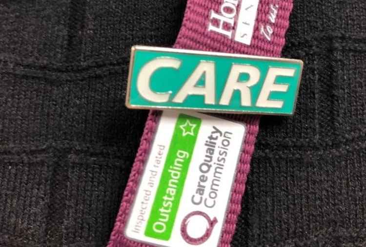 New CARE badge up close