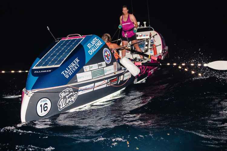 Force Genesis crossing the Talisker Whisky Atlantic Challenge finish line, in aid of Devon Freewheelers. Photo: Atlantic Campaigns